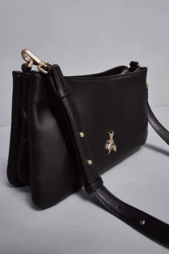 Borsa a tracolla con zip in pelle