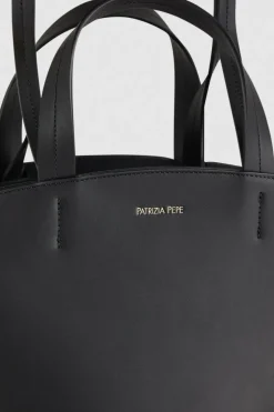 Borsa shopping in pelle con manici