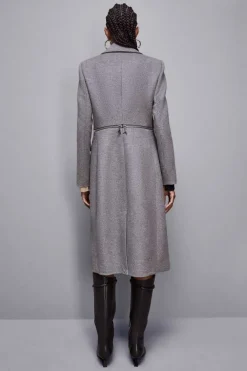 Cappotto con maxi-zip in vita