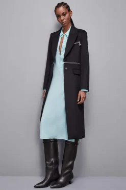 Cappotto con maxi-zip in vita