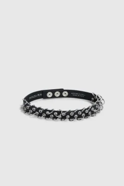 Choker con borchie in nikel e pelle