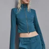 Giacca cropped a collo alto