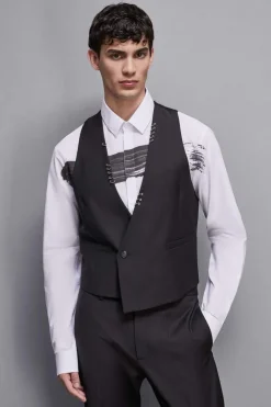 Gilet asimmetrico con piercing