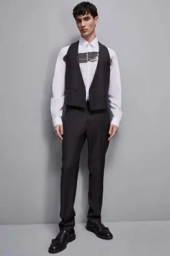 Gilet asimmetrico con piercing