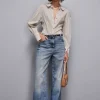 Jeans a vita bassa e gamba larga