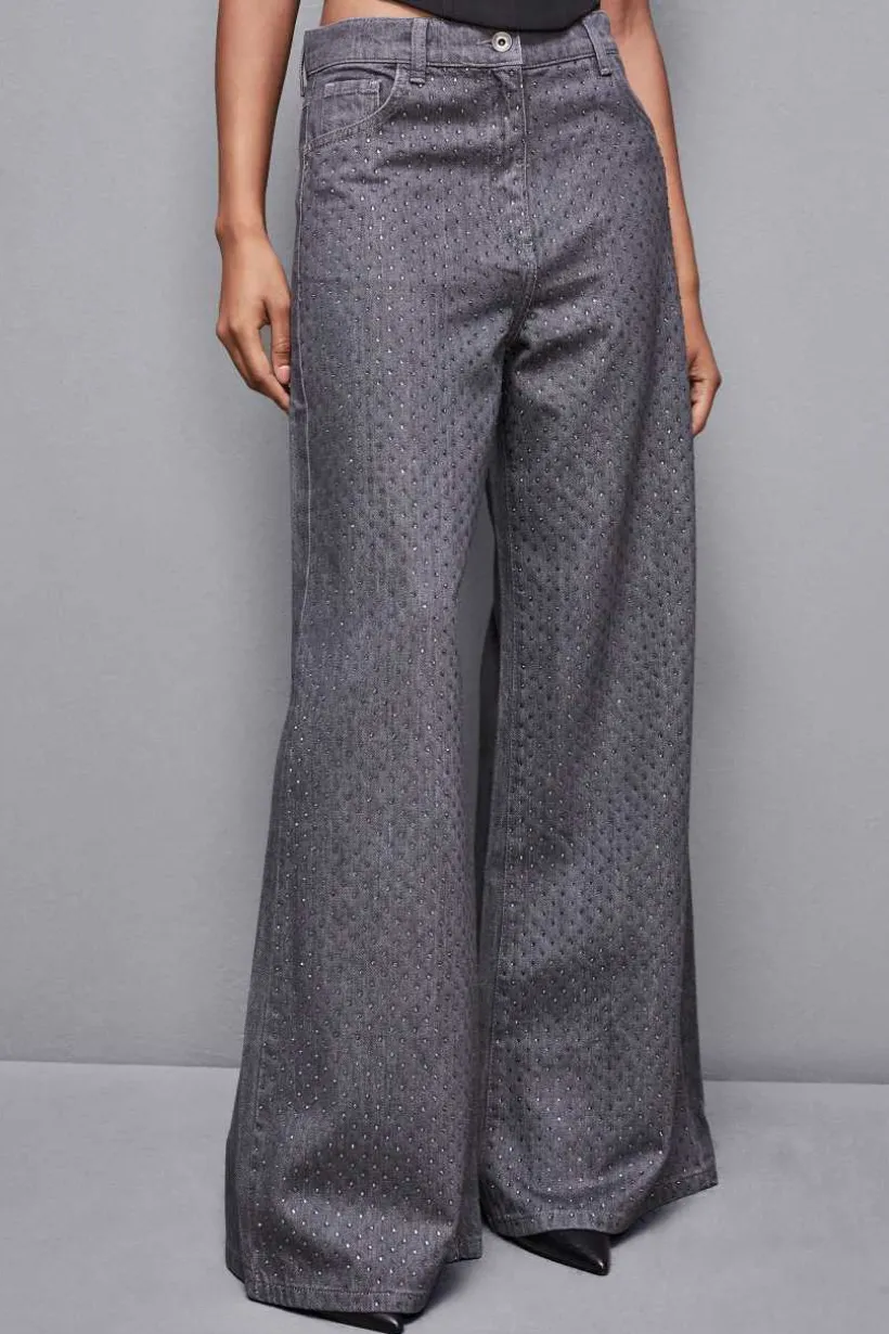 Jeans grigio vita bassa wide leg con strass