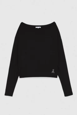 Maglia con spalla scesa 