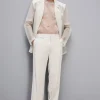 Pantalone slim fit con tasche alla francese