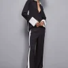 Pantalone vita bassa con banda colorata