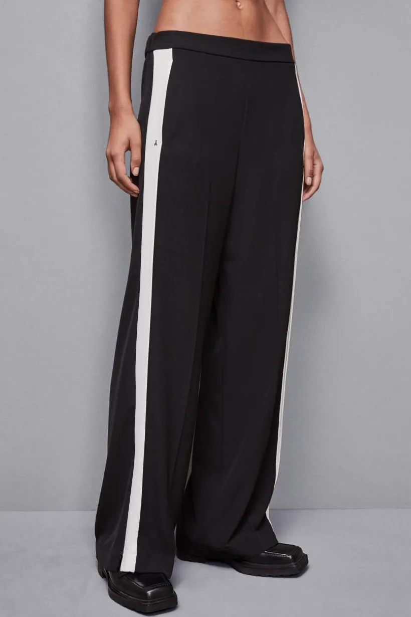 Pantalone vita bassa con banda colorata