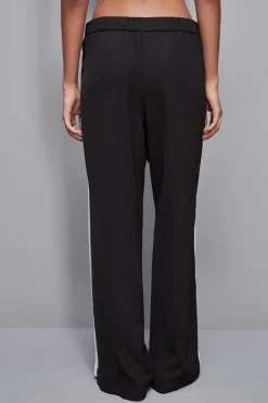 Pantalone vita bassa con banda colorata
