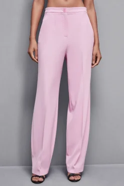 Pantaloni con pieghe in tessuto stretch