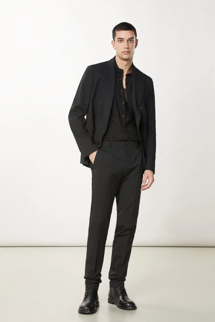 Pantaloni slim in tela