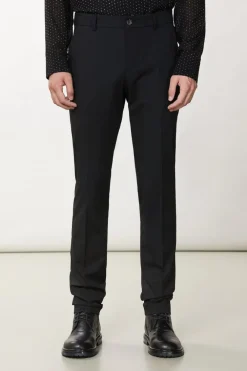 Pantaloni slim in tela