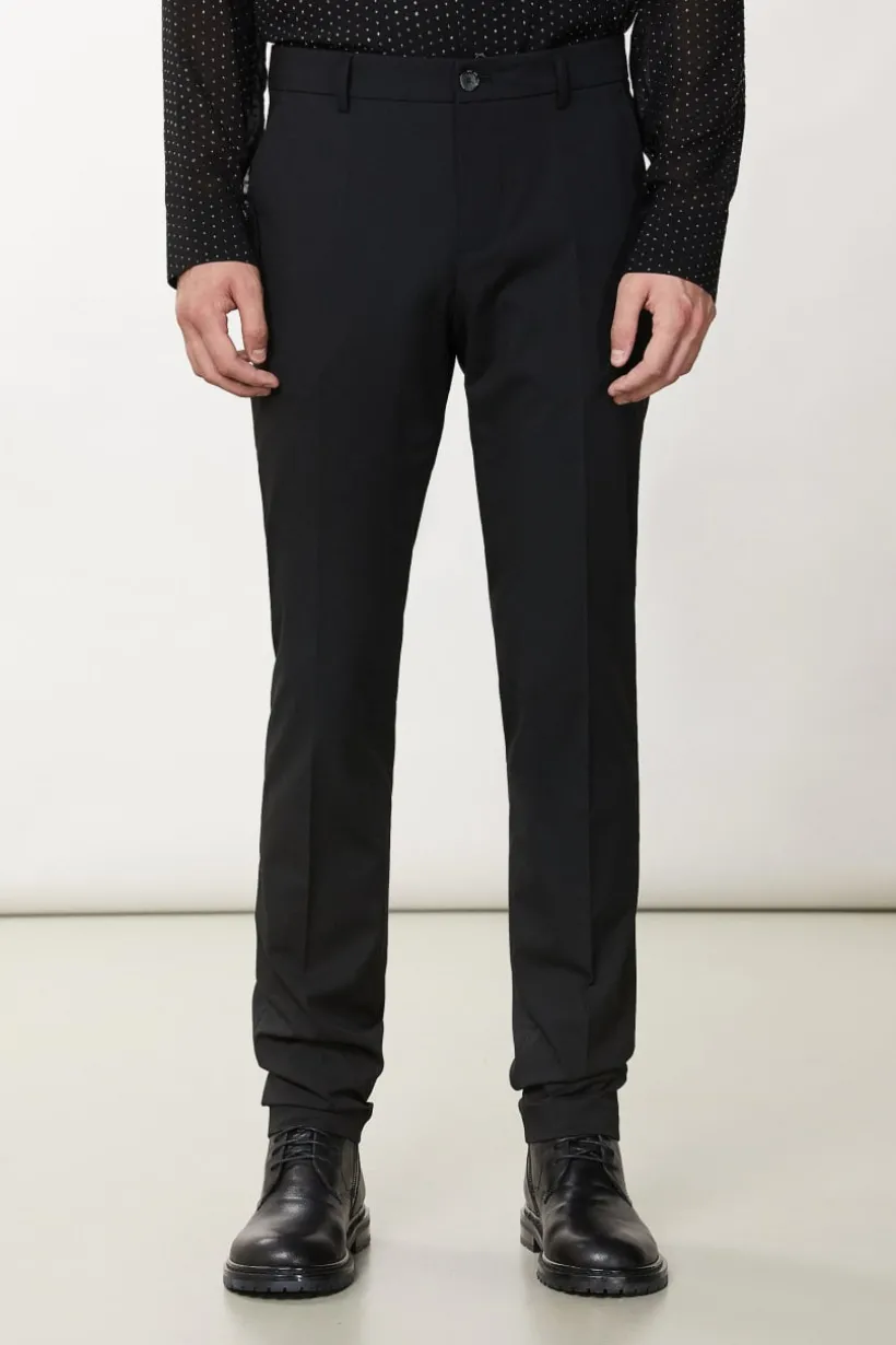Pantaloni slim in tela