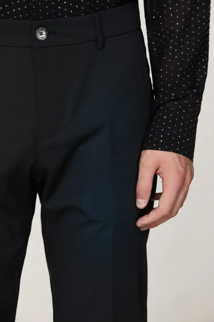 Pantaloni slim in tela