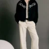 Pantaloni vita bassa in twill