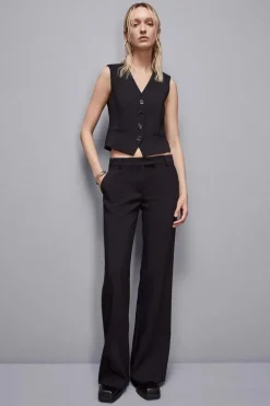Pantaloni vita bassa in twill