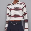 Polo cropped con manica lunga
