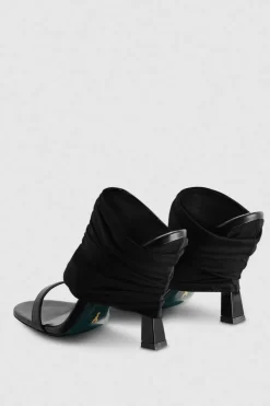 Sandali con tacco in pelle