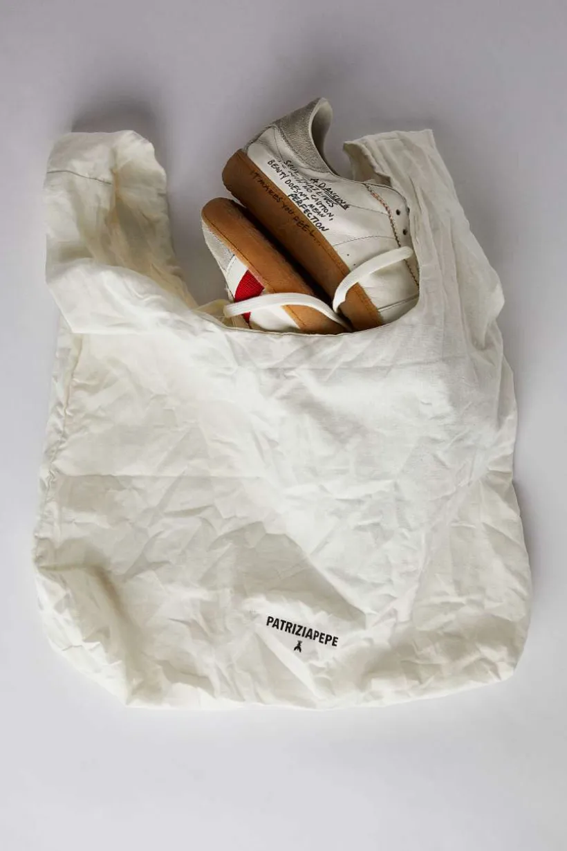 SKIN Sneakers in nappa con Lettering