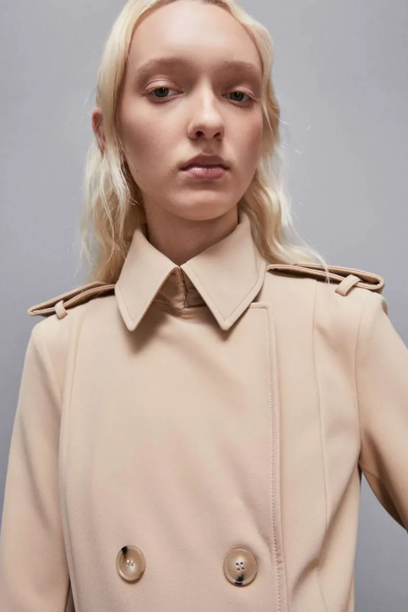 Trench con fibbia in nylon bielastico